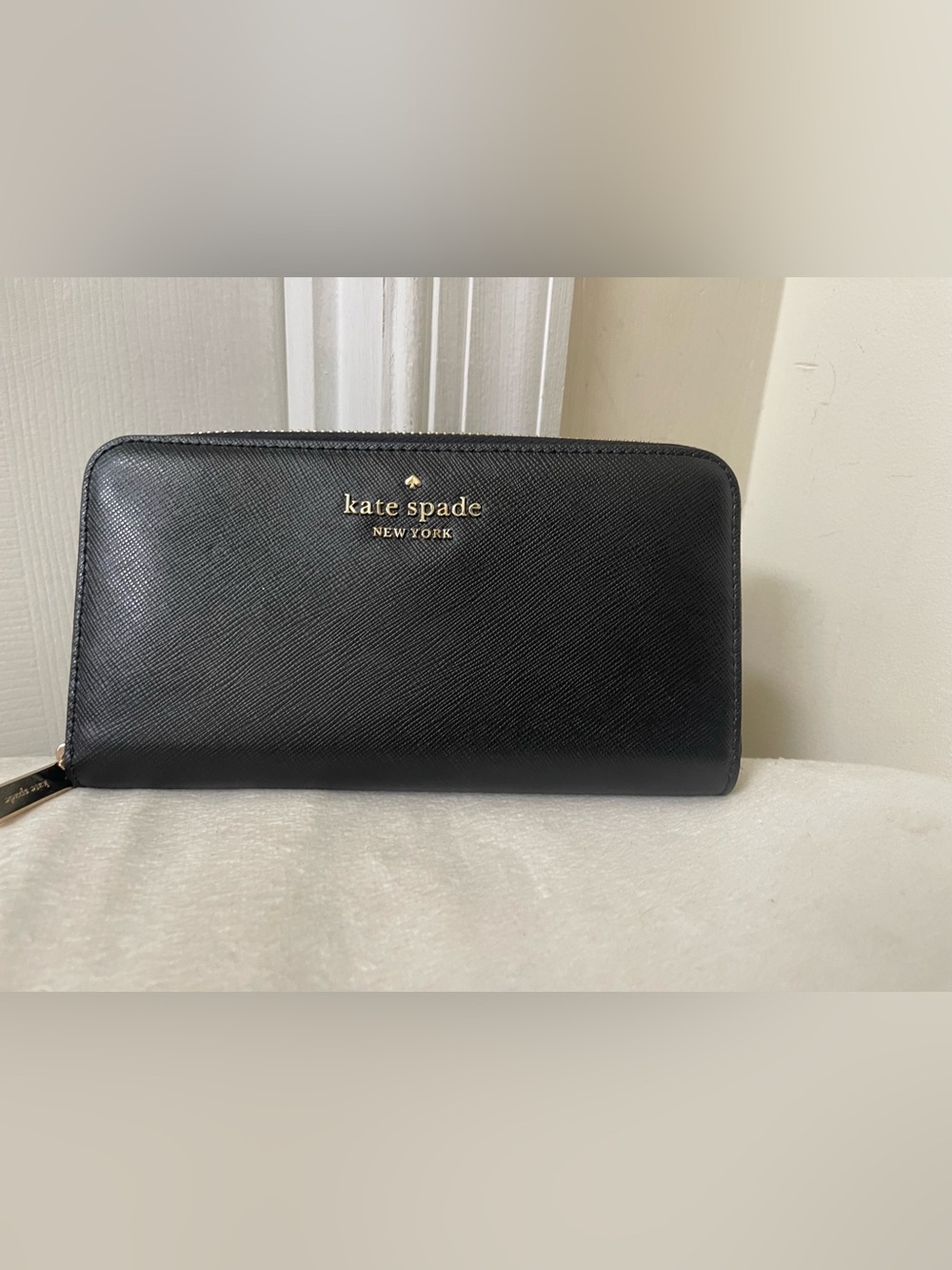 kate spade black zip-around continental wallet with gold logo